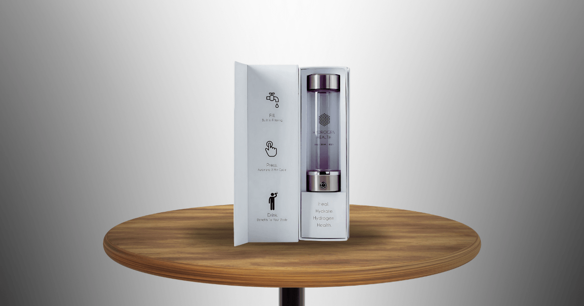 A bottle of liquid sits on a table next to a box, creating a simple yet intriguing arrangement.